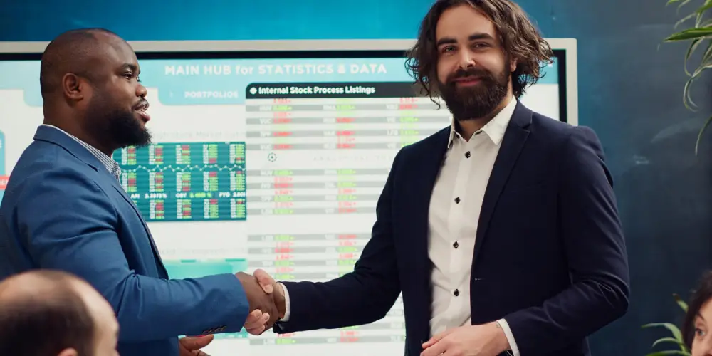 overføre aksjer til holdingselskap